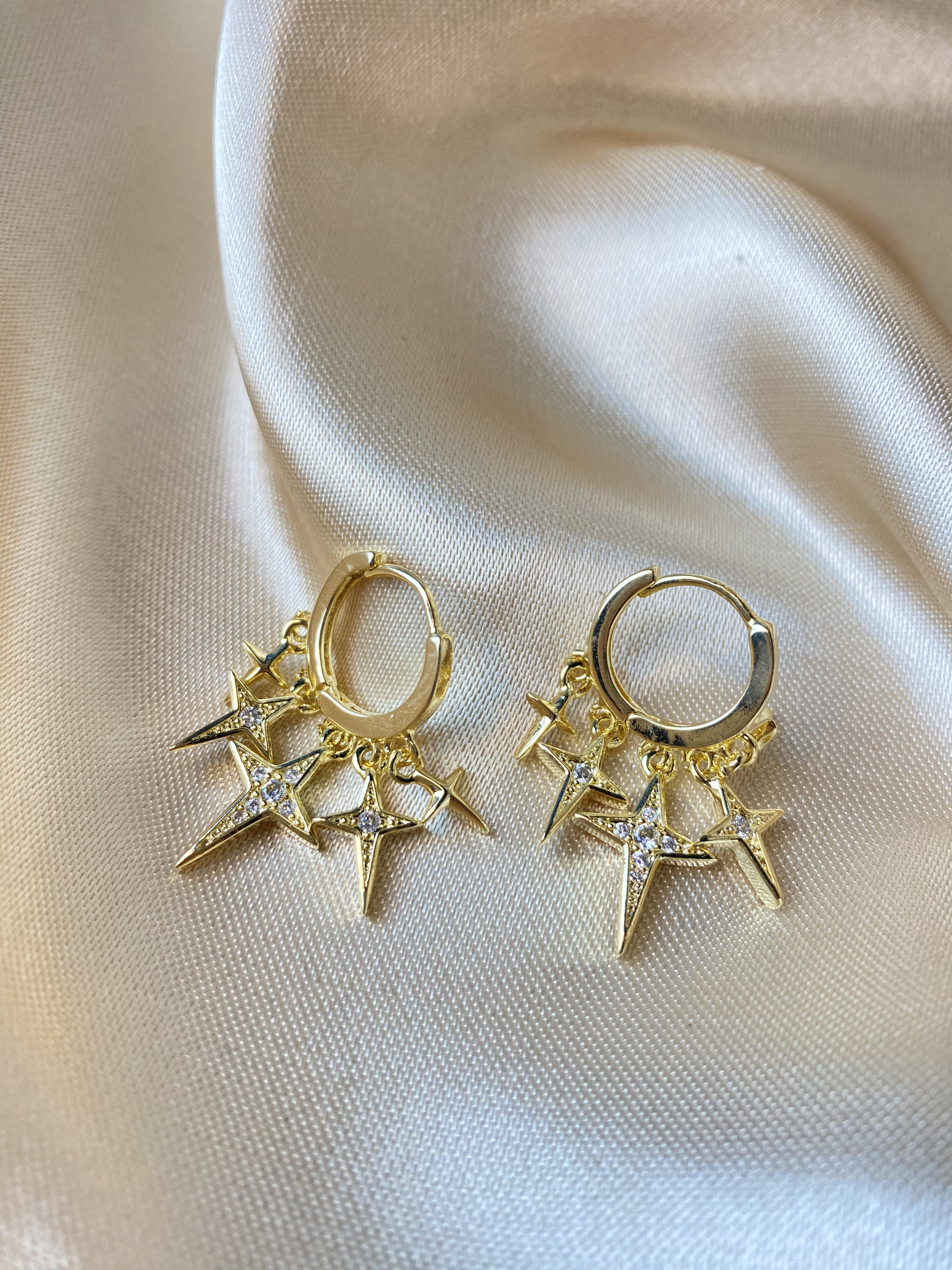 Gold plated hoop earrings with stars and CZ